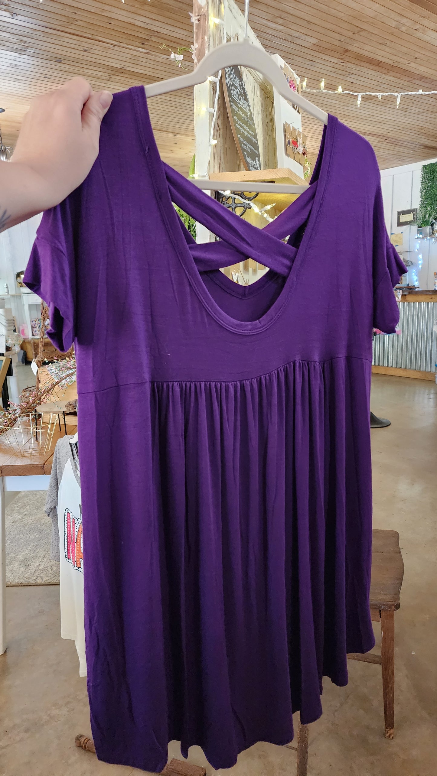 Purple Flowy Top with Criss Cross Back.