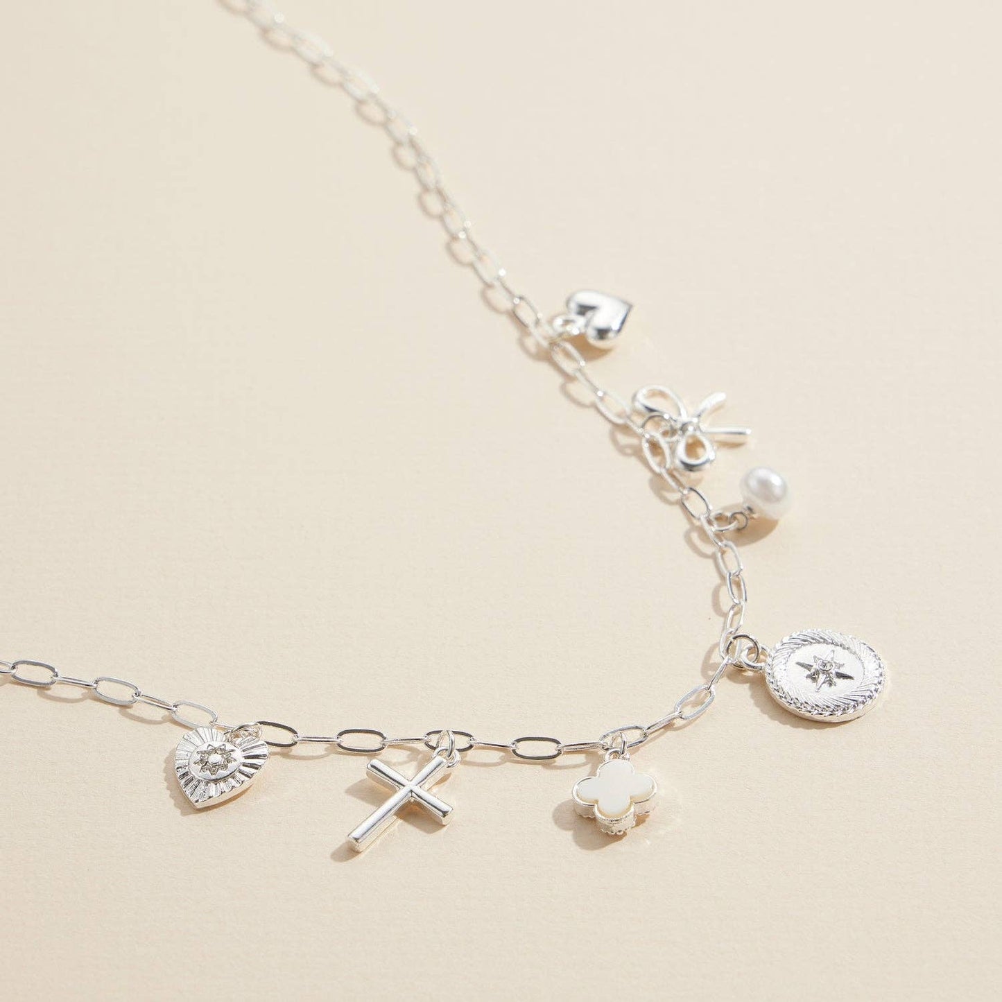 Charm Necklace with Heart, Cross, Compass & Bow Pendants