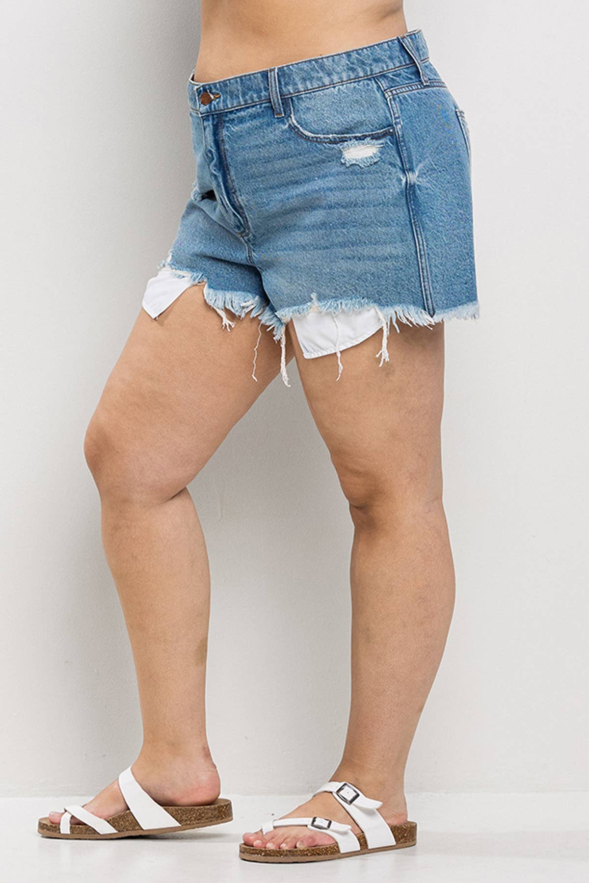 HIGH RISE PLUS SIZE  DENIM SHORTS WITH DISTRESSING, FRAYED HEM, AND VISIBLE POCKETS