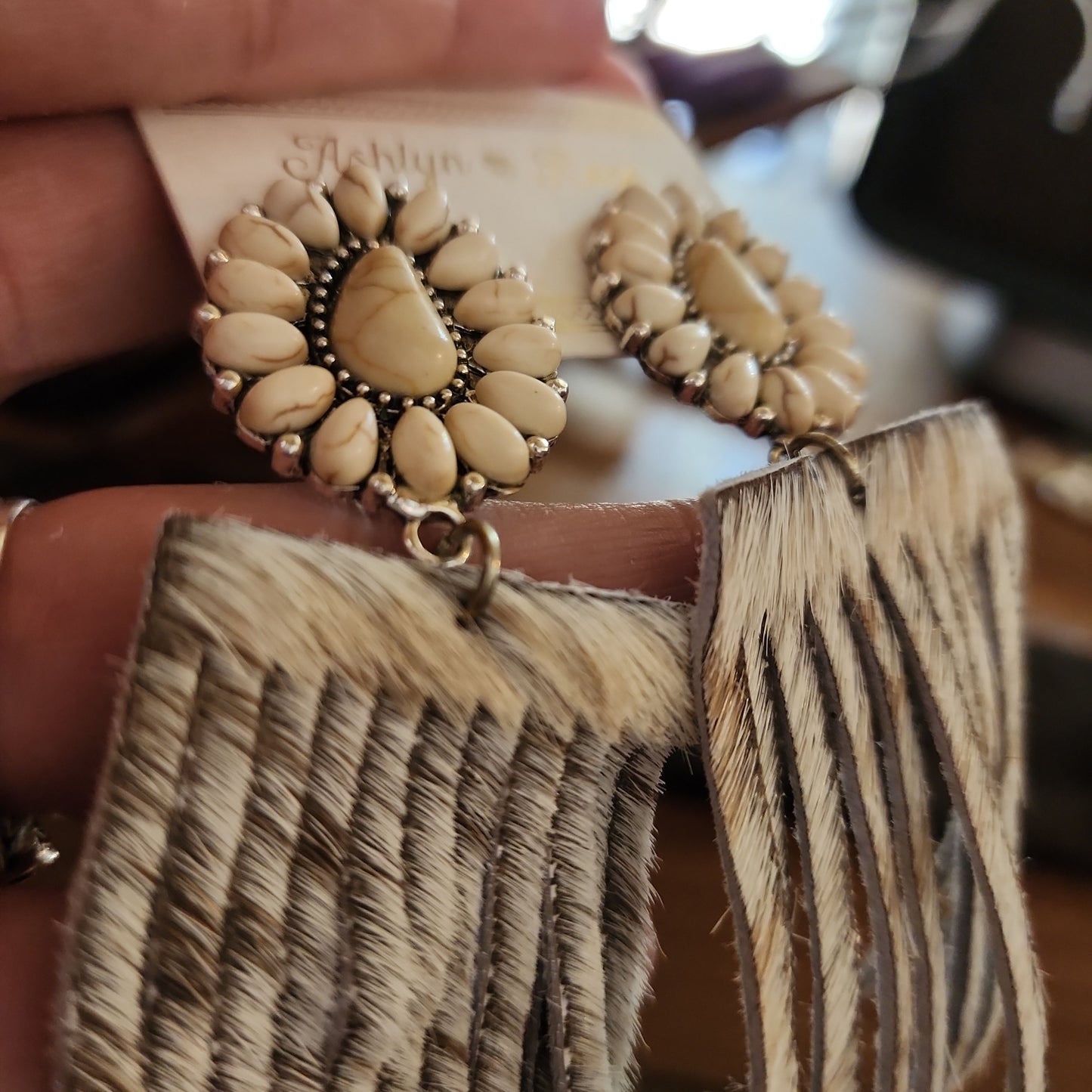 I'LL BE YOUR RANCH HAND WHITE HOWLITE FLORAL CONCHO WITH WHITE COWHIDE FRINGE EARRINGS