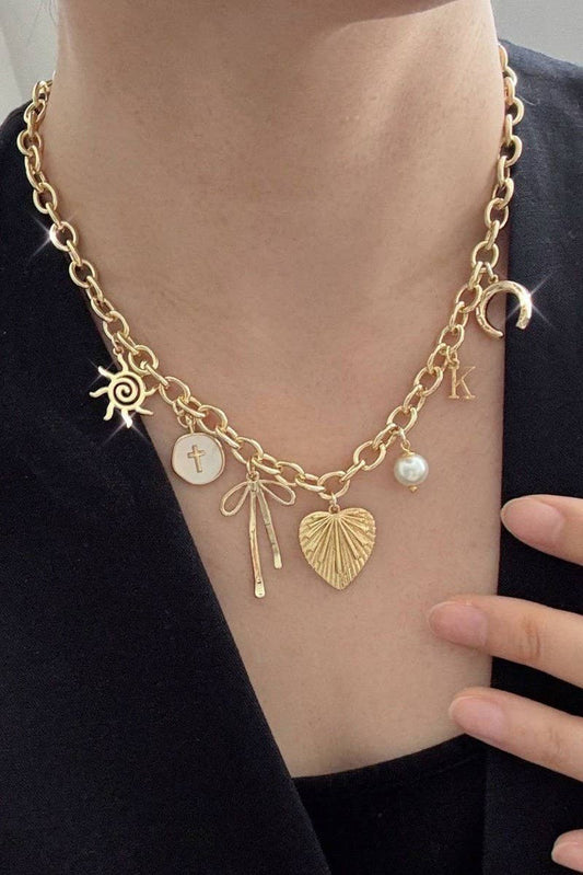 SUN BOW PEARL CROSS DISC CHARM NECKLACE